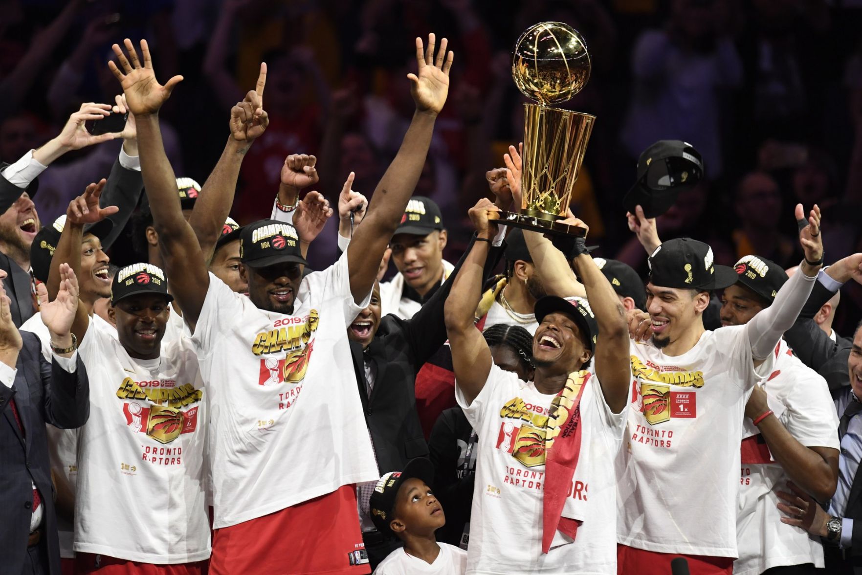 Kyle Lowry holds Larry O'Brien NBA Championship Trophy